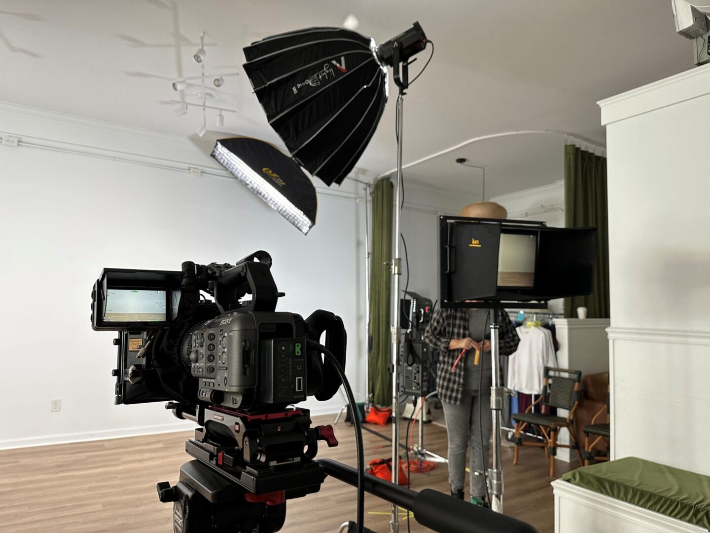 A camera is set up in the middle of a room.