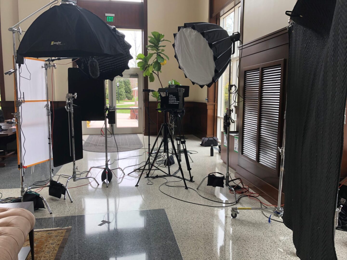 A photo studio set up in the middle of a room.