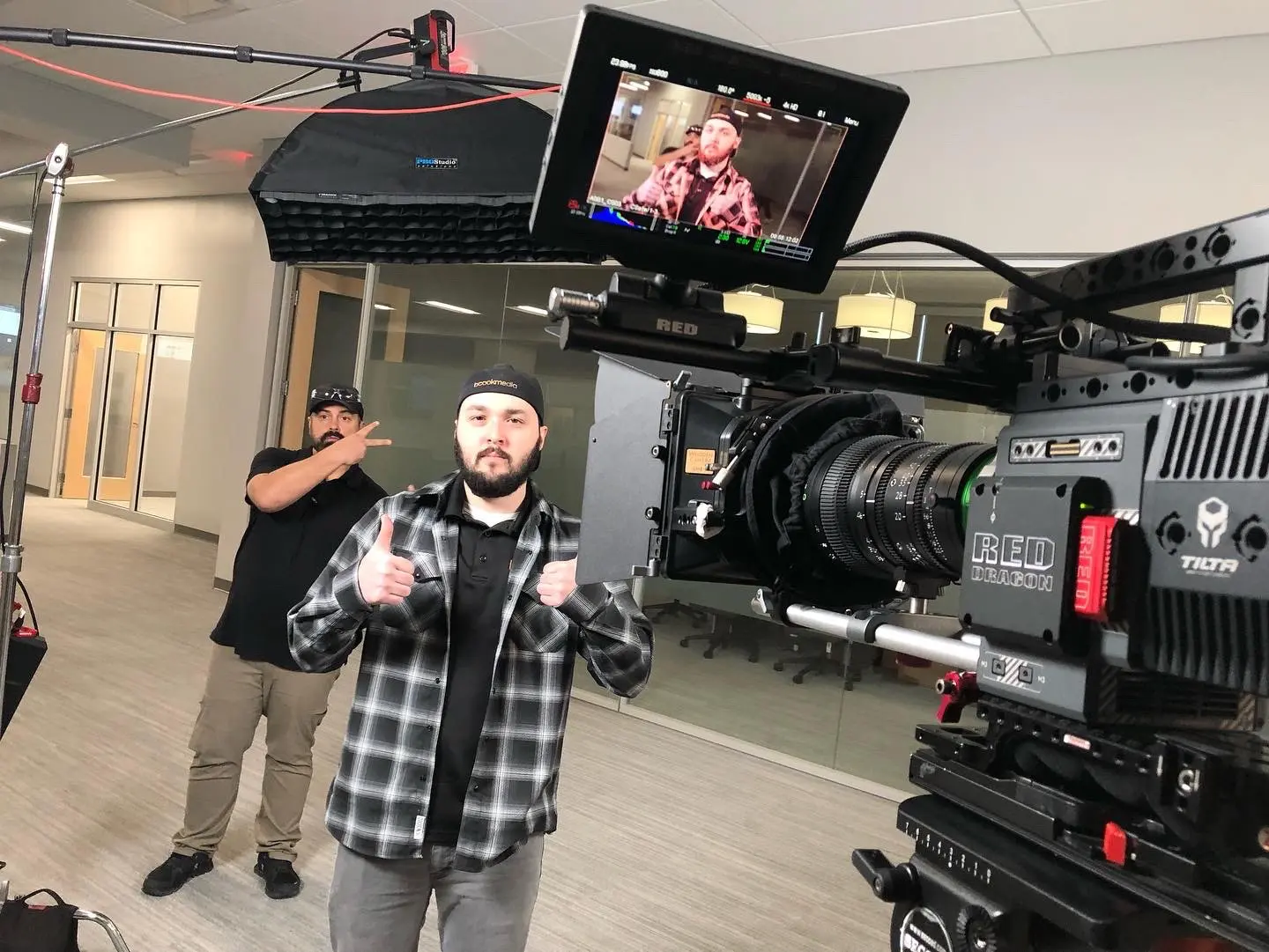 A man standing in front of a camera.